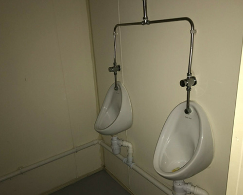 inside view of the toilet area in side the welfare unit container