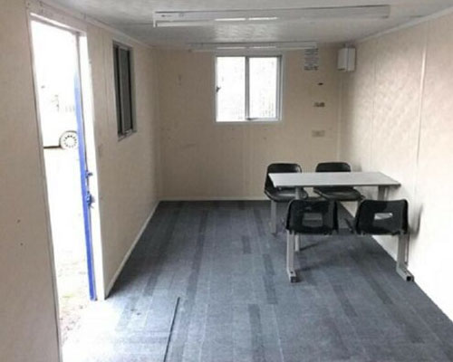 view of the canteen area with seating in the portable office / canteen