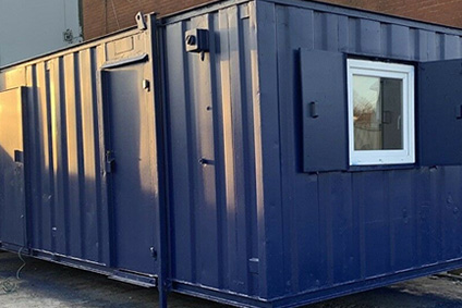 refurbished open plan office container in a blue colour