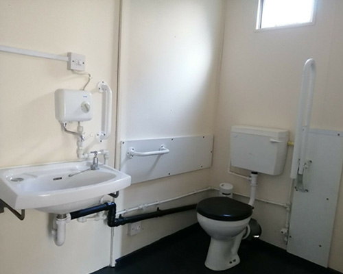 inside view of toilet unit, showing the toilet